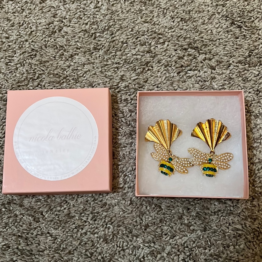 Nicola Bathie gold and green bumblebee earrings.